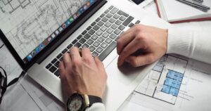 Planning a trip and booking direct on a laptop