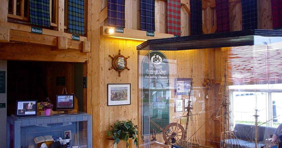 Warm heritage museum interior with local maritime artifacts, Bridgewater NS